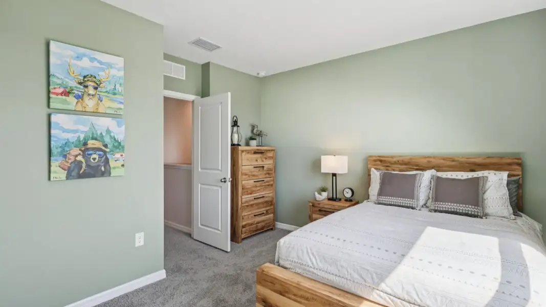 Furnished interior view inside a new home in Towns at Woodsdale, Wesley Chapel (Image 29).