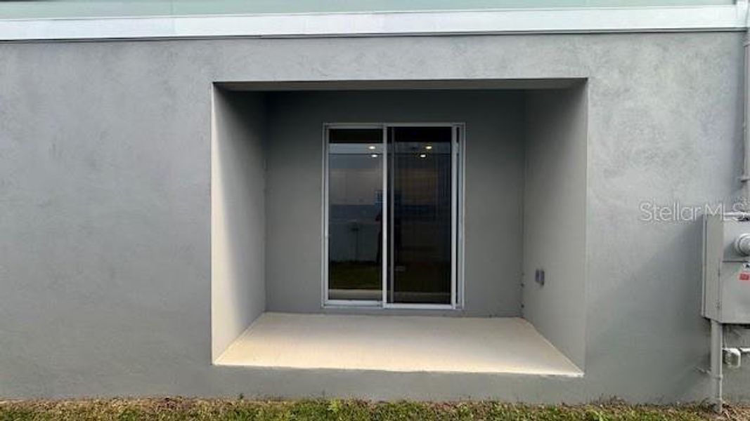 Exterior details and patio area of a home in Cypress Bluff, Groveland (Image 3).