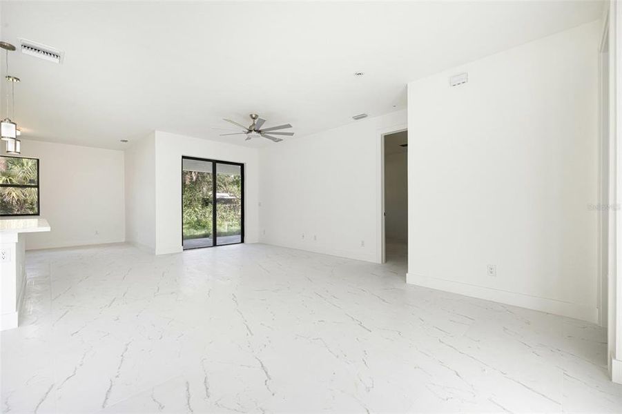 Spacious, unfurnished interior of a new home in , Port Charlotte (Image 20).