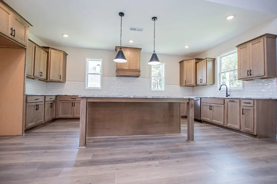 Furnished interior view inside a new home in WOODMONT RESERVE, Roopville (Image 8).