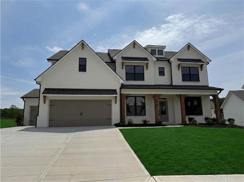 Front exterior of a new home in Rosewood Lake Estates, Hoschton, GA, highlighting curb appeal (Image 19).
