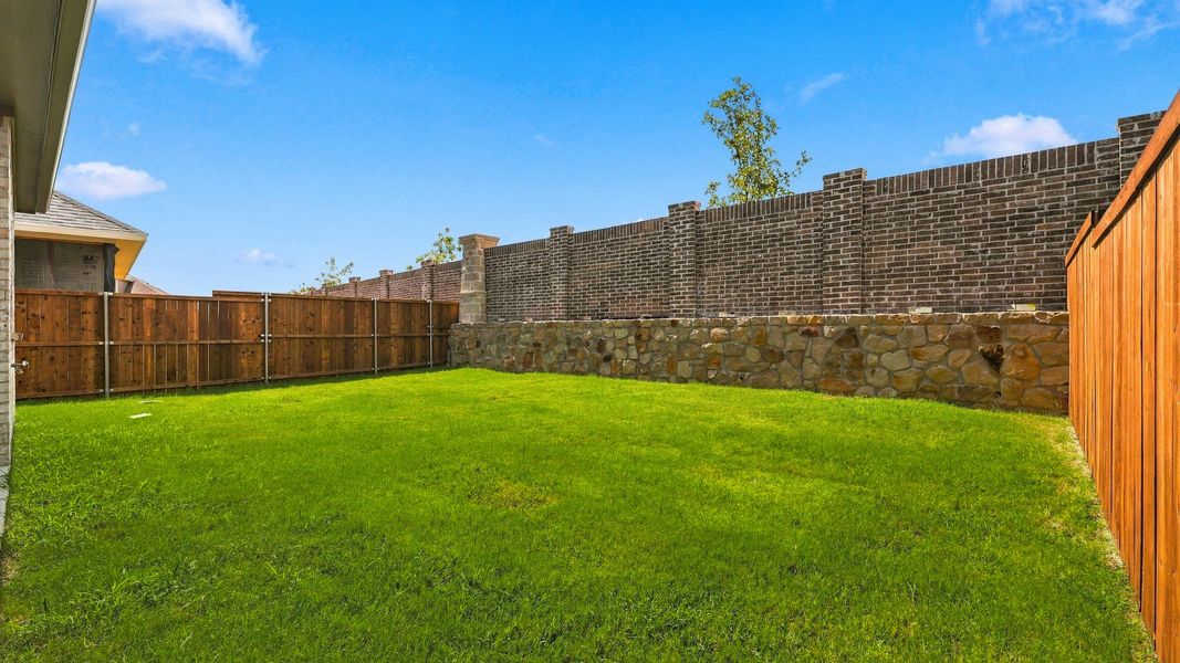 Exterior details and patio area of a home in Westridge Journey, McKinney (Image 4).