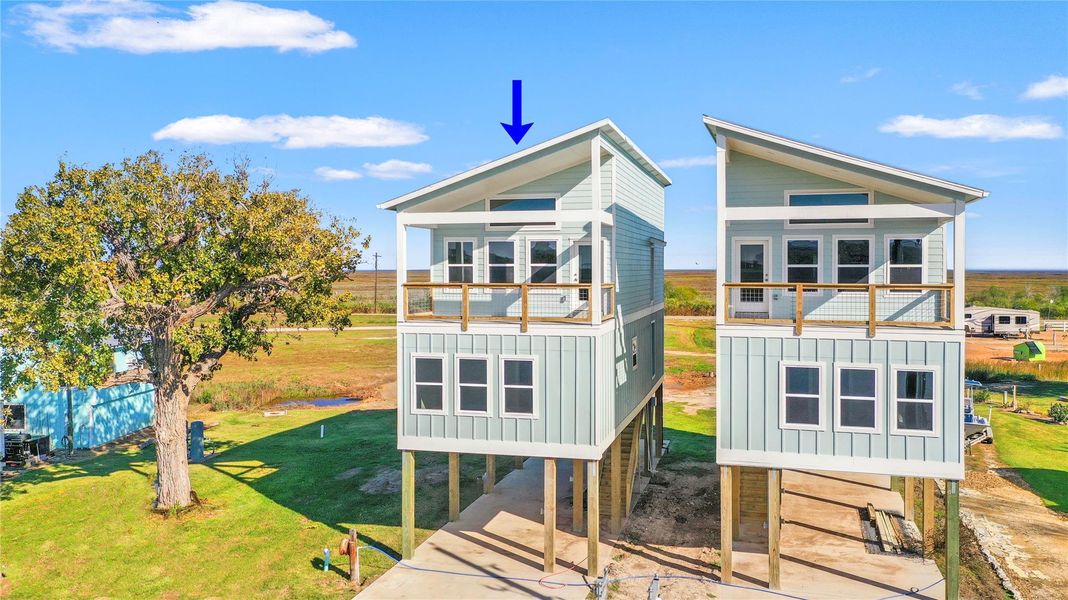 Front exterior of a new home in , Matagorda, TX, highlighting curb appeal (Image 2). Front exterior of a new home in , Matagorda, TX, highlighting curb appeal (Image 2).
