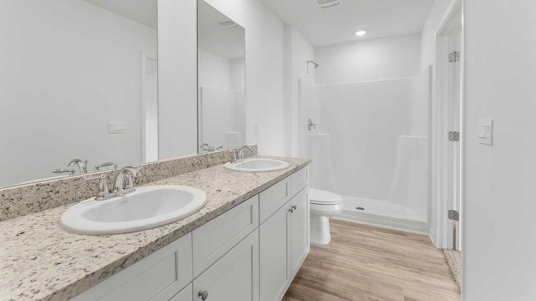 Furnished interior view inside a new home in Magnolia at the Bluffs Phase 3, Freeport (Image 9). Furnished interior view inside a new home in Magnolia at the Bluffs Phase 3, Freeport (Image 9).