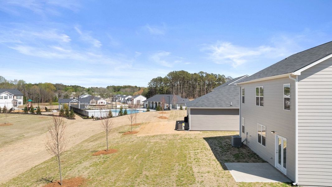 Exterior details and patio area of a home in Champion's Run, Lithonia (Image 1).
