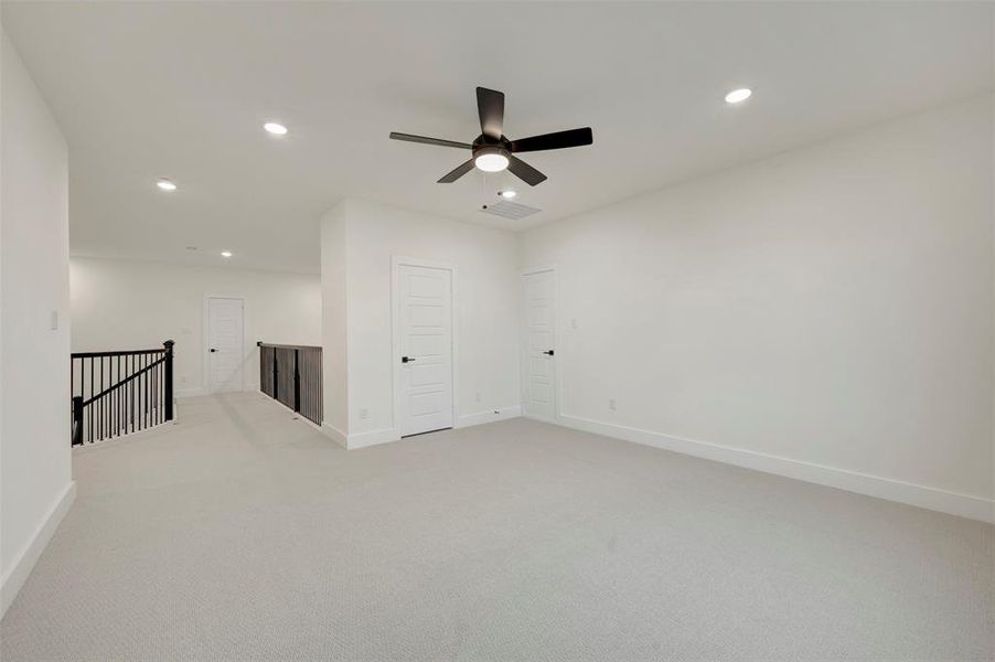 Retreat featuring light colored carpet, recessed lighting, and a ceiling fan