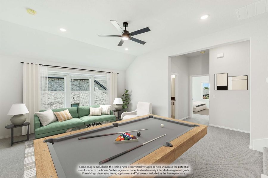 Game room with pool table, vaulted ceiling, ceiling fan, and green sofa near large windows