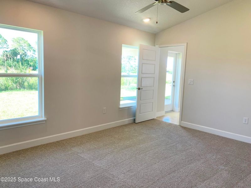 Spacious, unfurnished interior of a new home in St. John Preserve, Palm Bay (Image 8). Spacious, unfurnished interior of a new home in St. John Preserve, Palm Bay (Image 8).