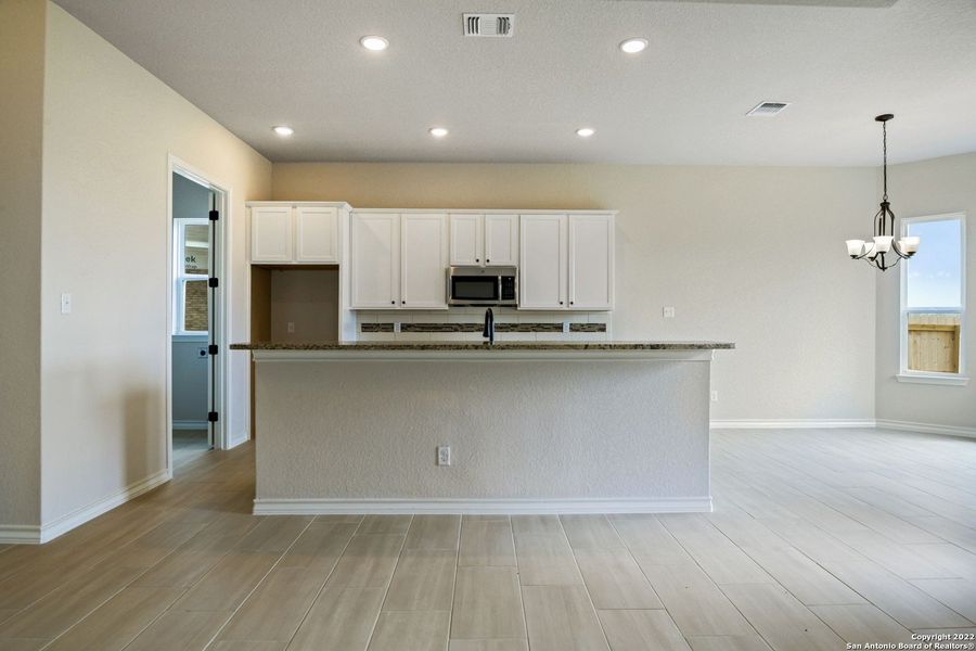 Furnished interior view inside a new home in Comanche Ridge, San Antonio (Image 7).