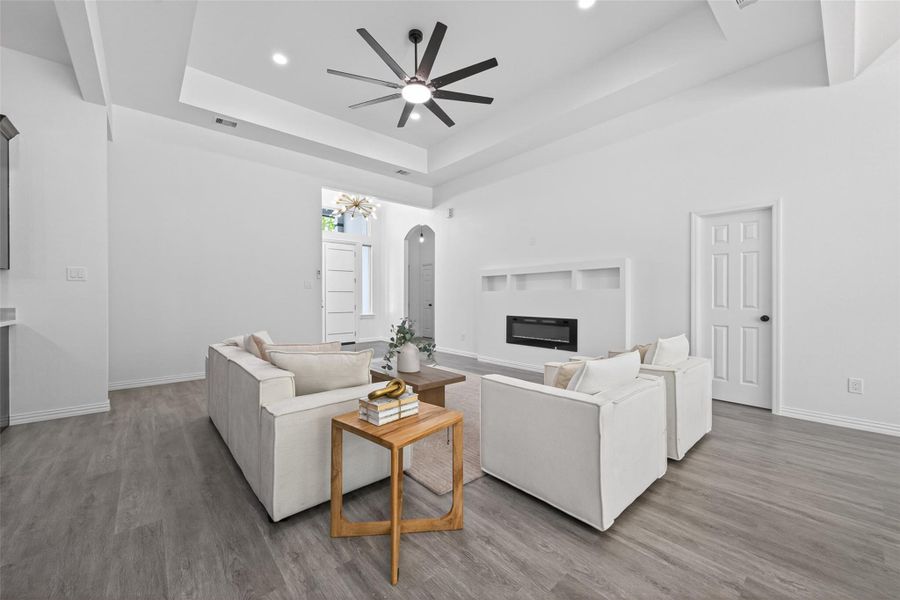 Expansive living room, offering seamless flow into the kitchen and dining areas.