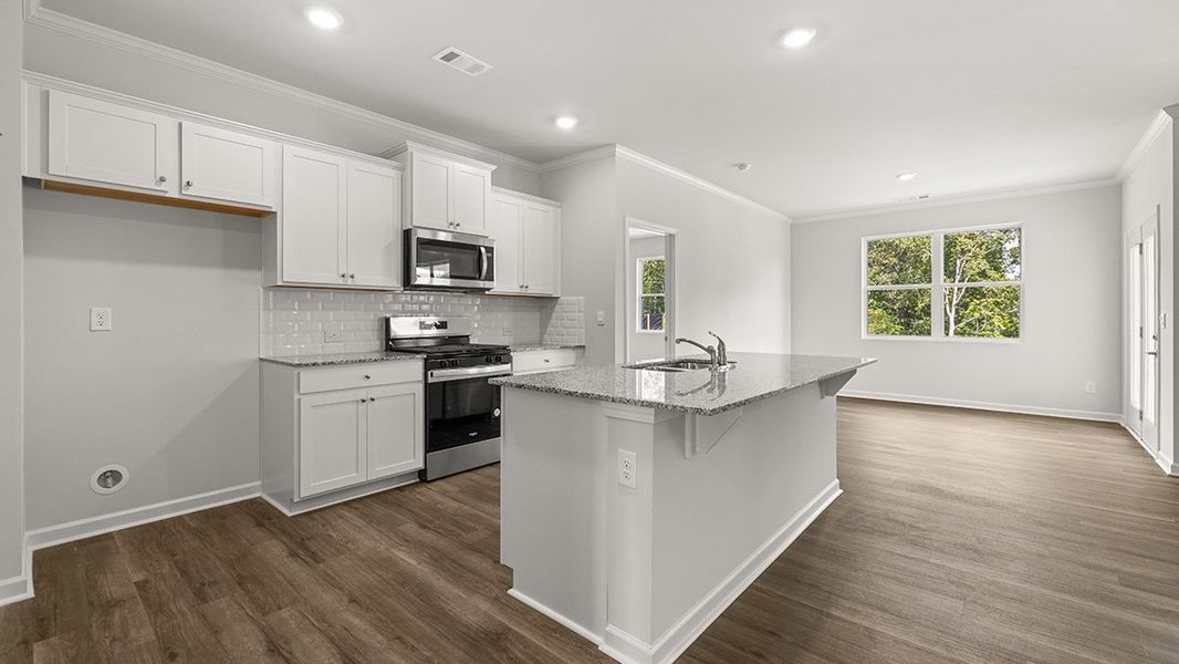 Furnished interior view inside a new home in Oaks at Cedar Grove, Fairburn (Image 4).