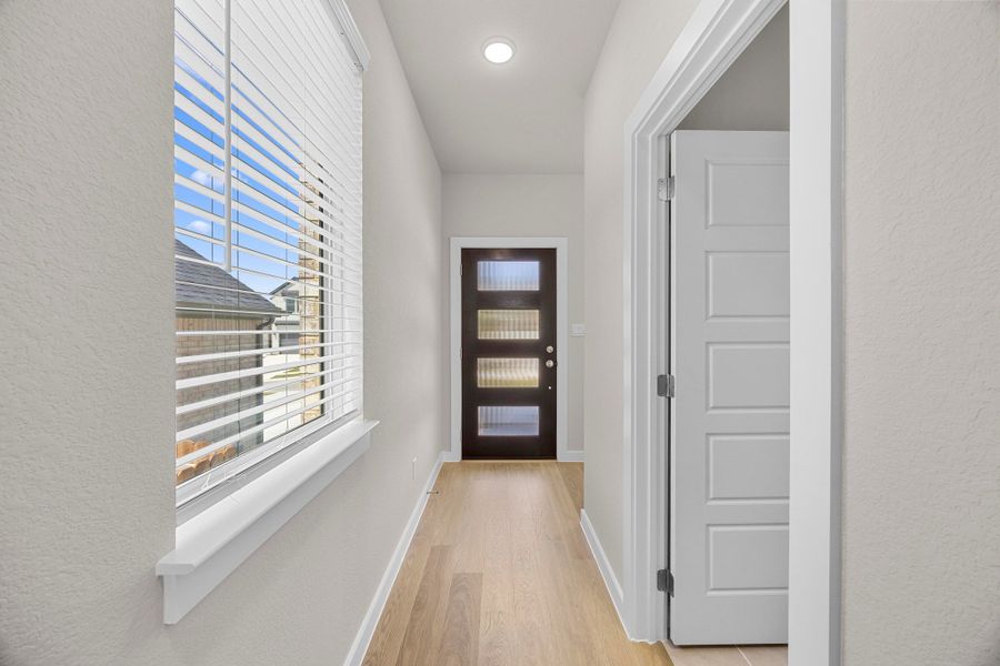 Entry in the Magnolia home plan by Trophy Signature Homes – REPRESENTATIVE PHOTO Entry in the Magnolia home plan by Trophy Signature Homes – REPRESENTATIVE PHOTO