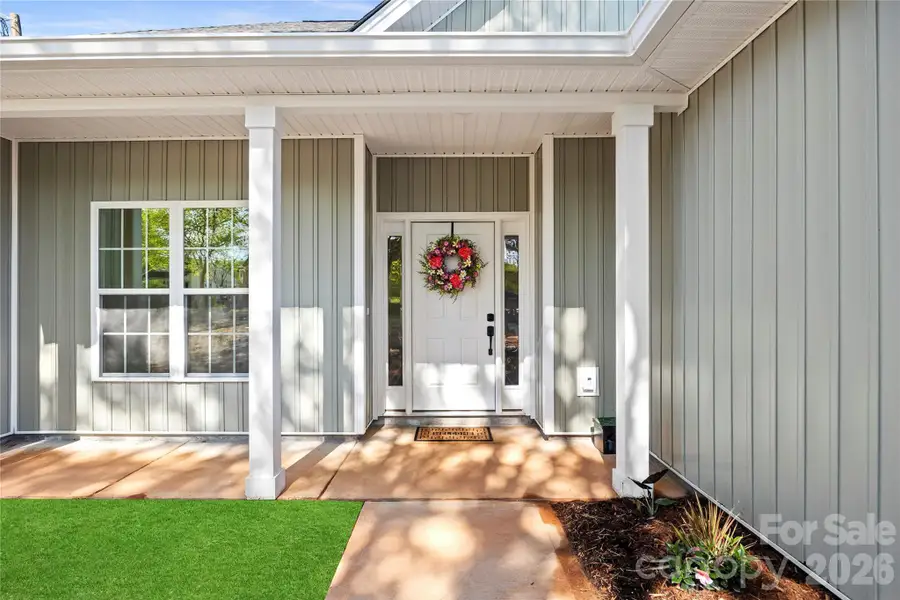 Exterior details and patio area of a home in , Troutman (Image 3).