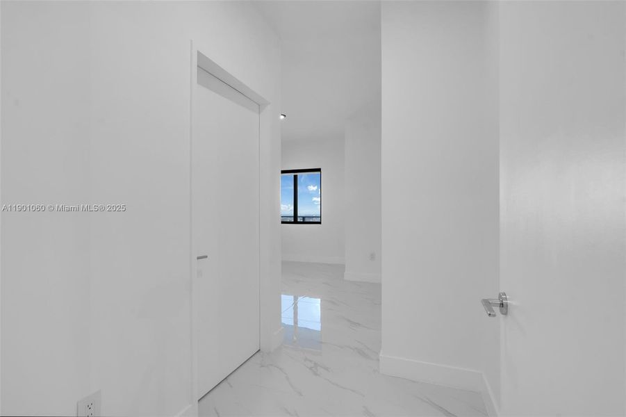 Spacious, unfurnished interior of a new home in Aria Reserve, Miami (Image 33). Spacious, unfurnished interior of a new home in Aria Reserve, Miami (Image 33).