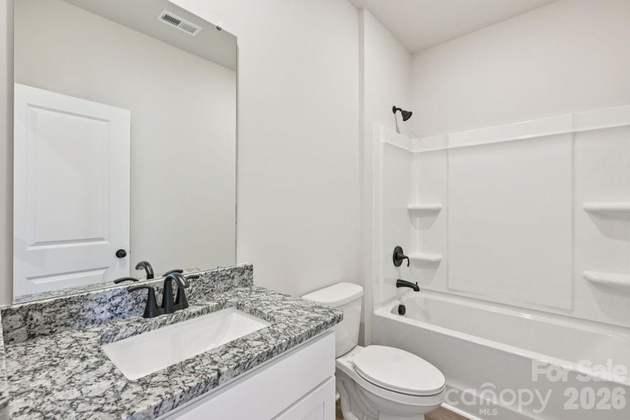 Furnished interior view inside a new home in Willow Estates, Shelby (Image 5).