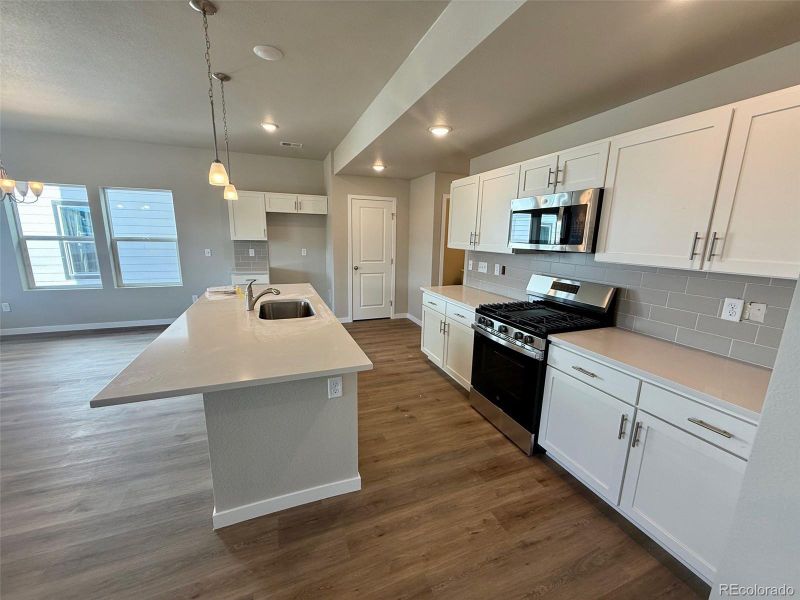 Furnished interior view inside a new home in Sky Ranch – Uptown Collection, Watkins (Image 4).