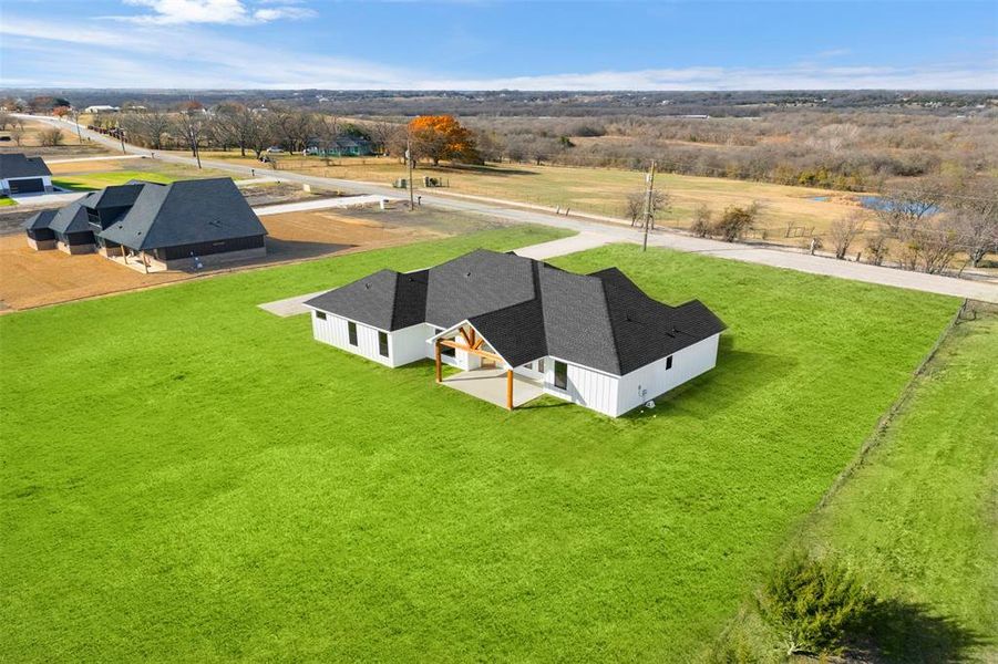 Front exterior of a new home in , Palmer, TX, highlighting curb appeal (Image 21).