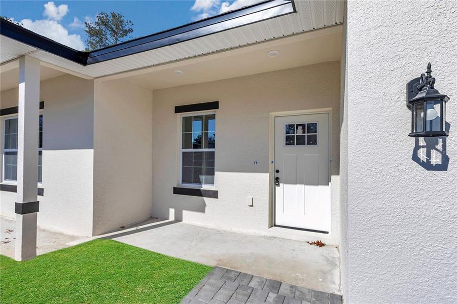 Exterior details and patio area of a home in , Ocala (Image 29).