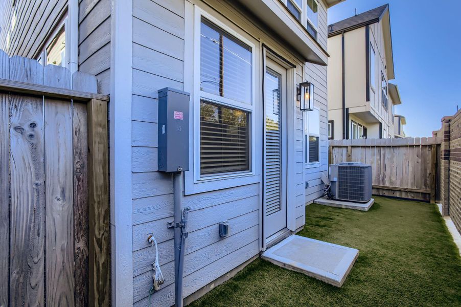 Exterior details and patio area of a home in , Houston (Image 3).