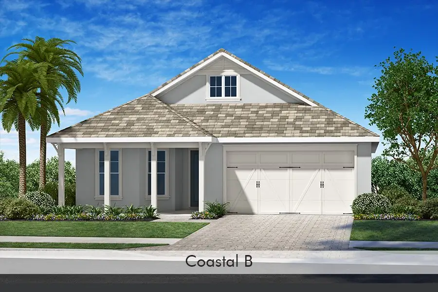 Representative exterior photo of a completed home built from the Cay by Homes by Towne in Shellstone at Waterside, Sarasota, FL (Image 10).