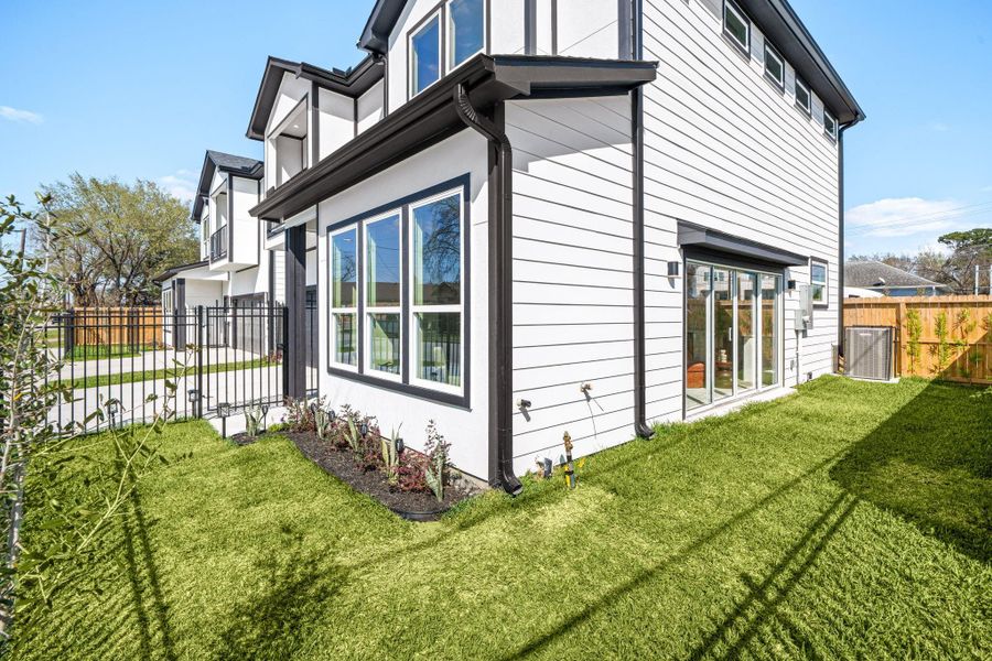 Exterior details and patio area of a home in , Houston (Image 24).
