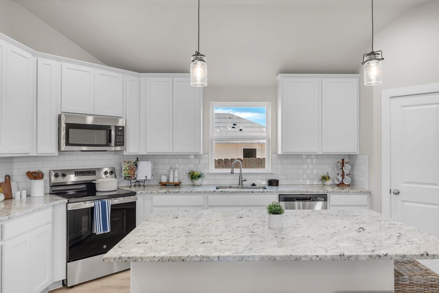 Representative furnished interior of a home built from the The Poppy by Avonley Homes in Rudder Pointe, Bryan (Image 28).