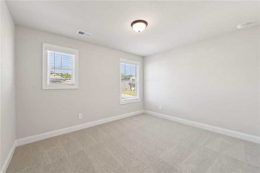 Spacious, unfurnished interior of a new home in Vines at Mill Creek - Estate Series, Braselton (Image 53).