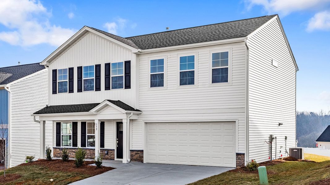 Front exterior of a new home in Hanes Lake, Winston-Salem, NC, highlighting curb appeal (Image 2). Front exterior of a new home in Hanes Lake, Winston-Salem, NC, highlighting curb appeal (Image 2).