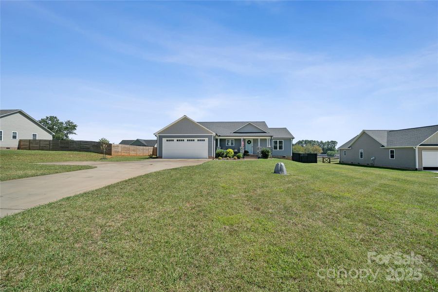 Front exterior of a new home in , Lincolnton, NC, highlighting curb appeal (Image 20).