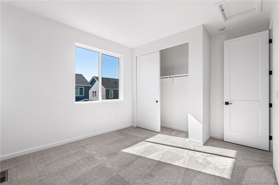 Spacious, unfurnished interior of a new home in Tribute at Lyric, Lone Tree (Image 25).