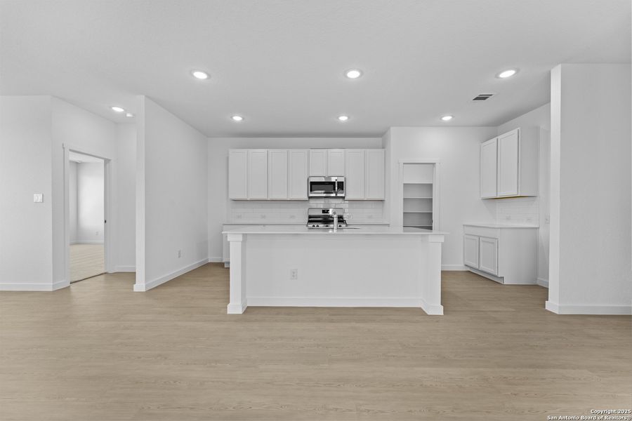 Furnished interior view inside a new home in Hidden Trails: Coastline Collection, Bulverde (Image 14).