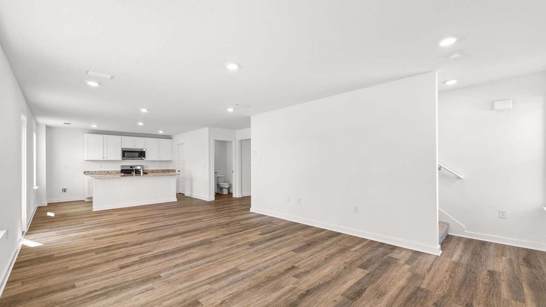 Spacious, unfurnished interior of a new home in Magnolia at the Bluffs Phase 3, Freeport (Image 12).