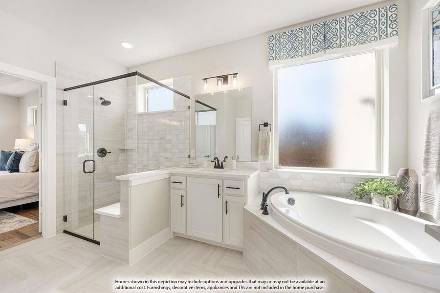 Master bathroom with glass walk-in shower, soaking tub, white vanity, and large window with privacy glass.