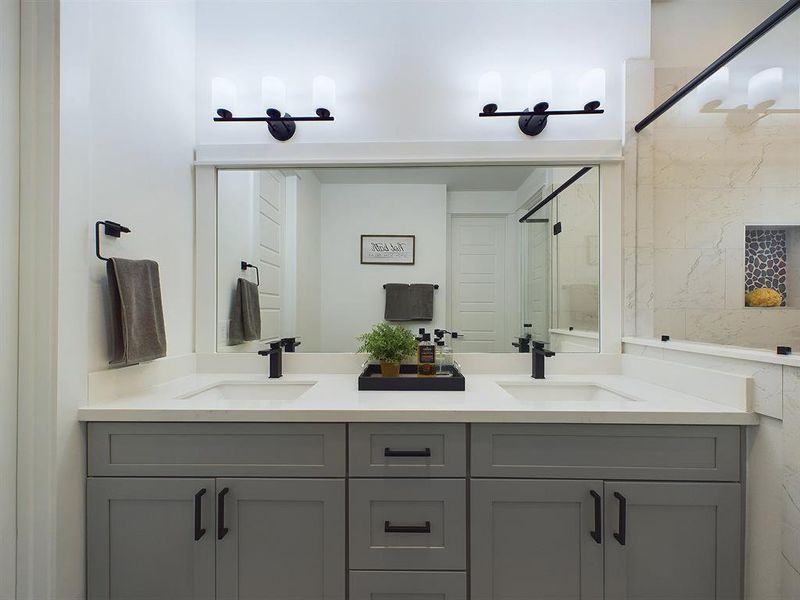 Beautiful Primary Bath with Quartz double sink vanity top and soft close drawers and doors.