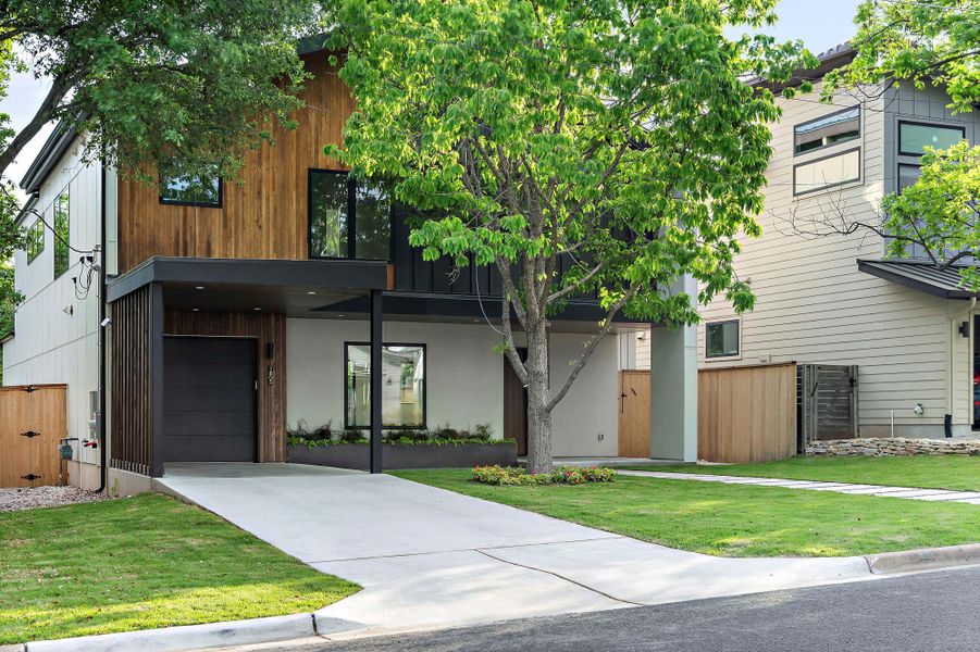 Front exterior of a new home in , Austin, TX, highlighting curb appeal (Image 22).