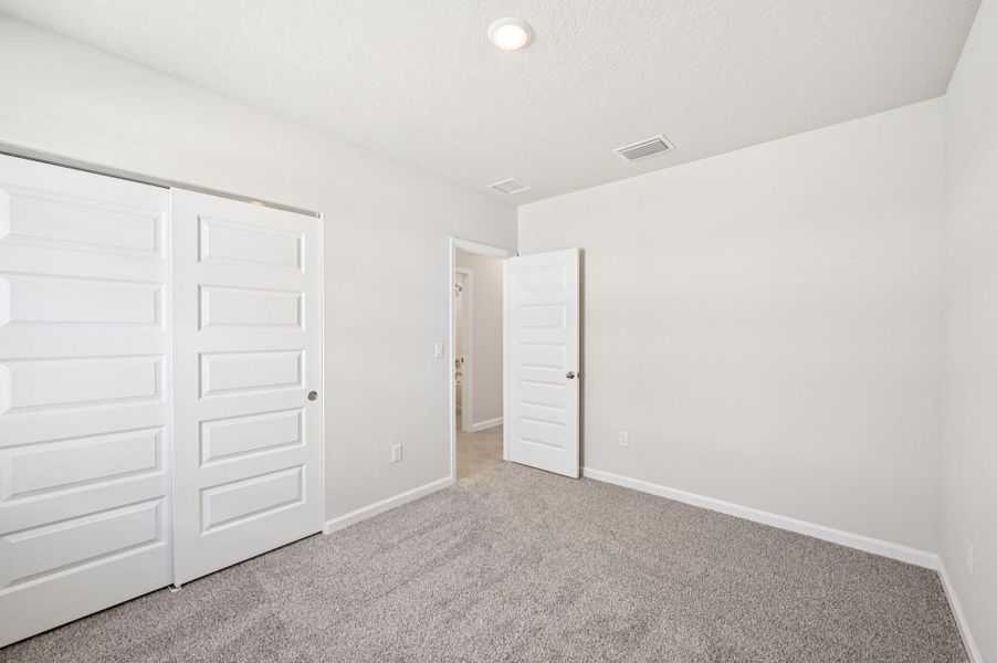 Spacious, unfurnished interior of a new home in Hampton Park - Classic Series, Vero Beach (Image 26). Spacious, unfurnished interior of a new home in Hampton Park - Classic Series, Vero Beach (Image 26).