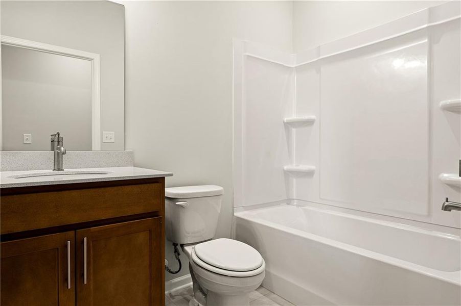 Furnished interior view inside a new home in Watermist at Mirror Lake, Villa Rica (Image 7).
