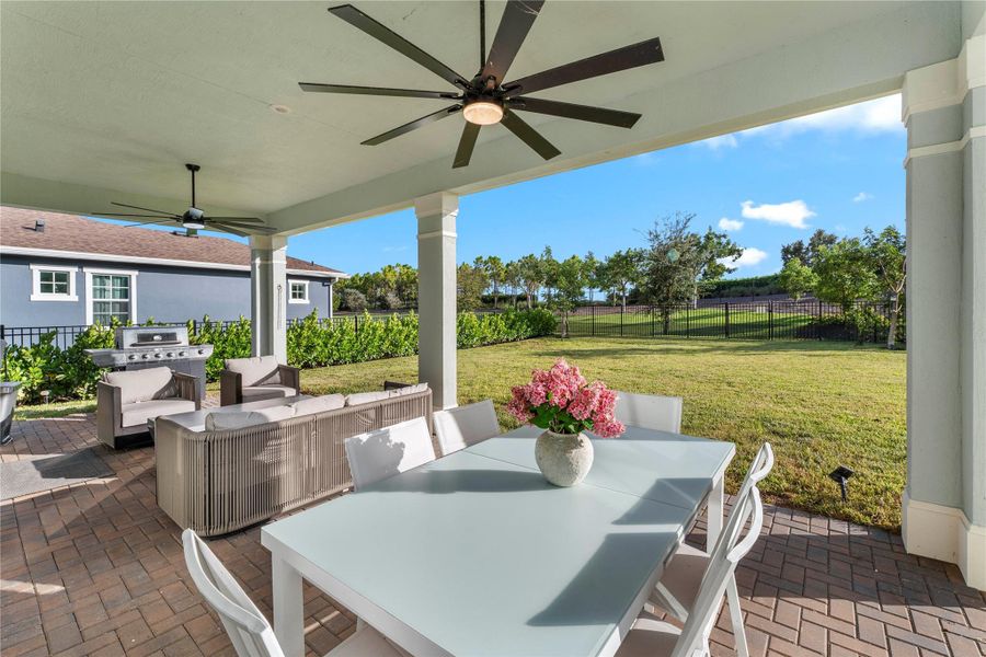 Exterior details and patio area of a home in Arden: The Waterford Collection, Loxahatchee (Image 20).