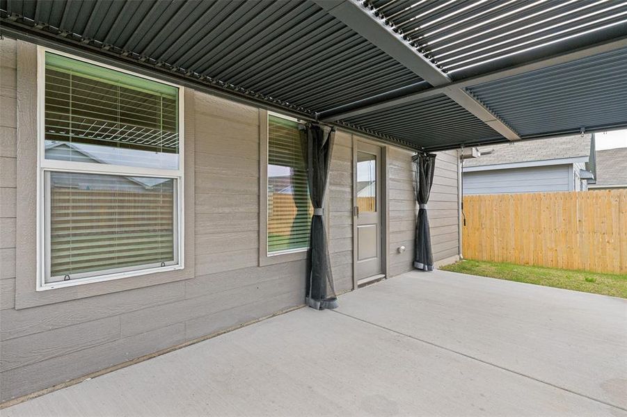 Exterior details and patio area of a home in Tillage Farms, Princeton (Image 3).