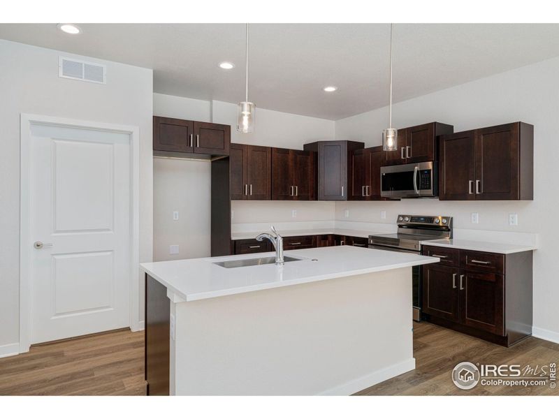 Furnished interior view inside a new home in , Fort Lupton (Image 13).