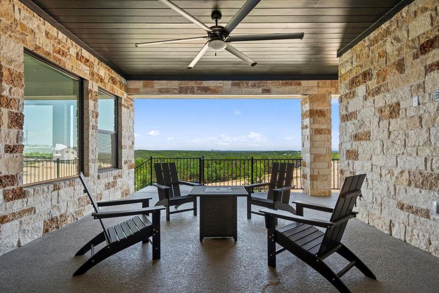 Exterior details and patio area of a home in Milky Way at River Place, Austin (Image 27).