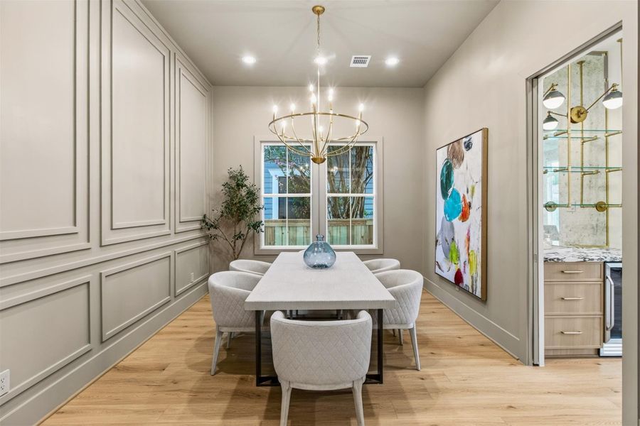 Perfect for hosting gatherings, the formal dining room blends elegance and functionality with easy access to the butler’s pantry for effortless entertaining. Perfect for hosting gatherings, the formal dining room blends elegance and functionality with easy access to the butler’s pantry for effortless entertaining.