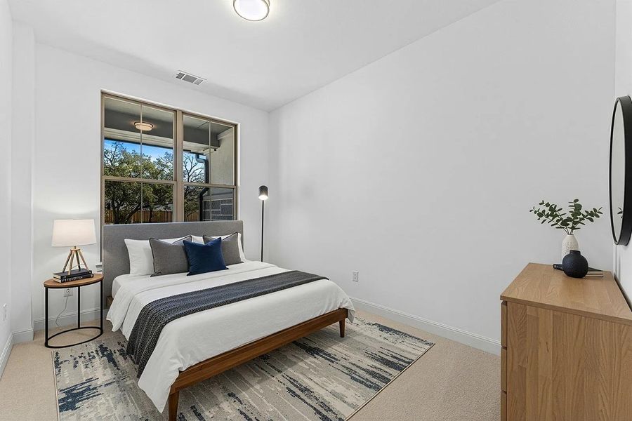 Furnished interior view inside a new home in Parmer Ranch 60, Georgetown (Image 10).