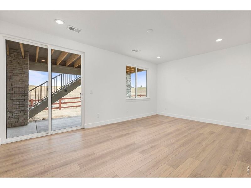Spacious, unfurnished interior of a new home in RainDance, Windsor (Image 46).