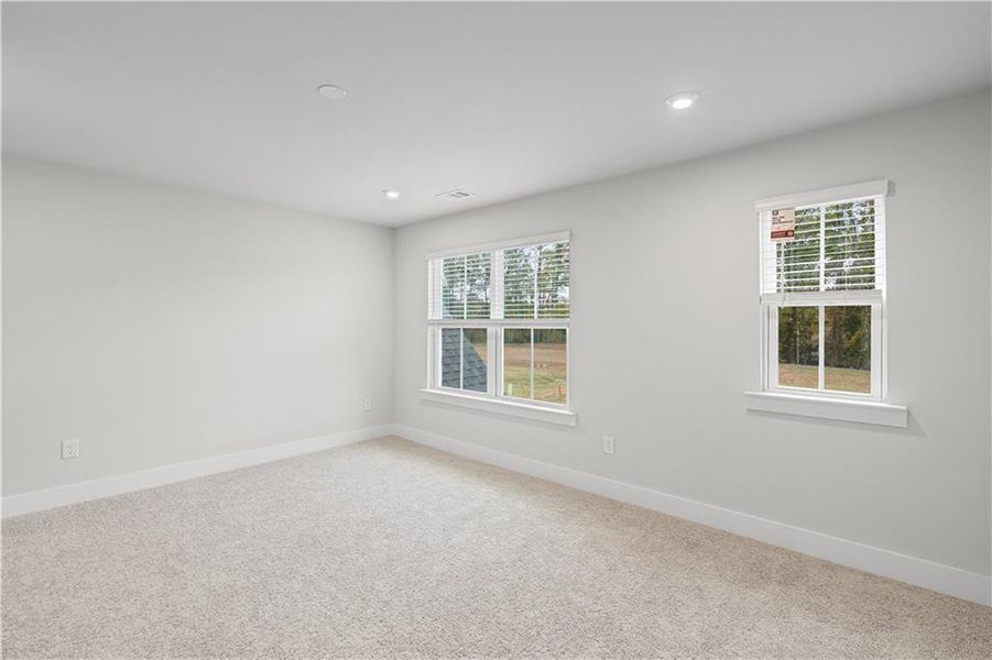 Spacious, unfurnished interior of a new home in Rose Creek, Cumming (Image 40).