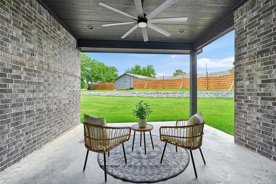 View of patio / terrace with a ceiling fan View of patio / terrace with a ceiling fan