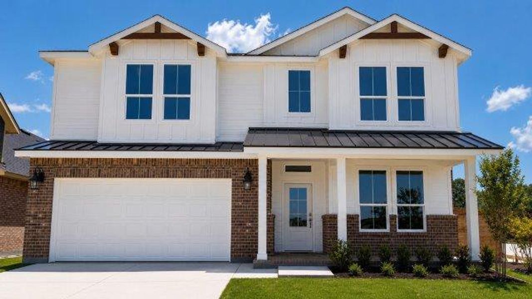 Front exterior of a new home in Treeline, Justin, TX, highlighting curb appeal (Image 1). Front exterior of a new home in Treeline, Justin, TX, highlighting curb appeal (Image 1).