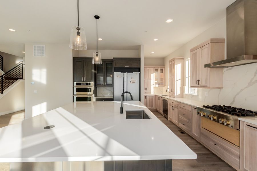Representative furnished interior of a home built from the Luxe by Scott Felder Homes in Westerly, Erie (Image 7).