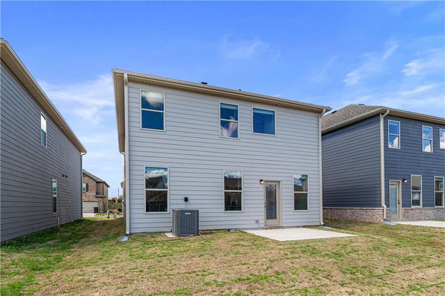Exterior details and patio area of a home in Towne Center, Hampton (Image 4).