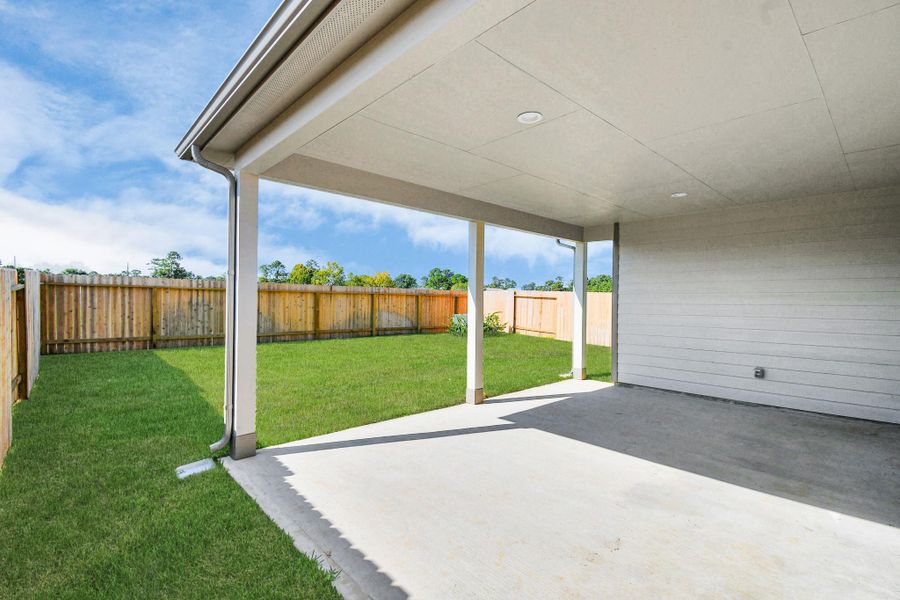 Experience outdoor living at its finest on this expansive covered patio, thoughtfully designed for BBQs and delightful outdoor dining. Experience outdoor living at its finest on this expansive covered patio, thoughtfully designed for BBQs and delightful outdoor dining.